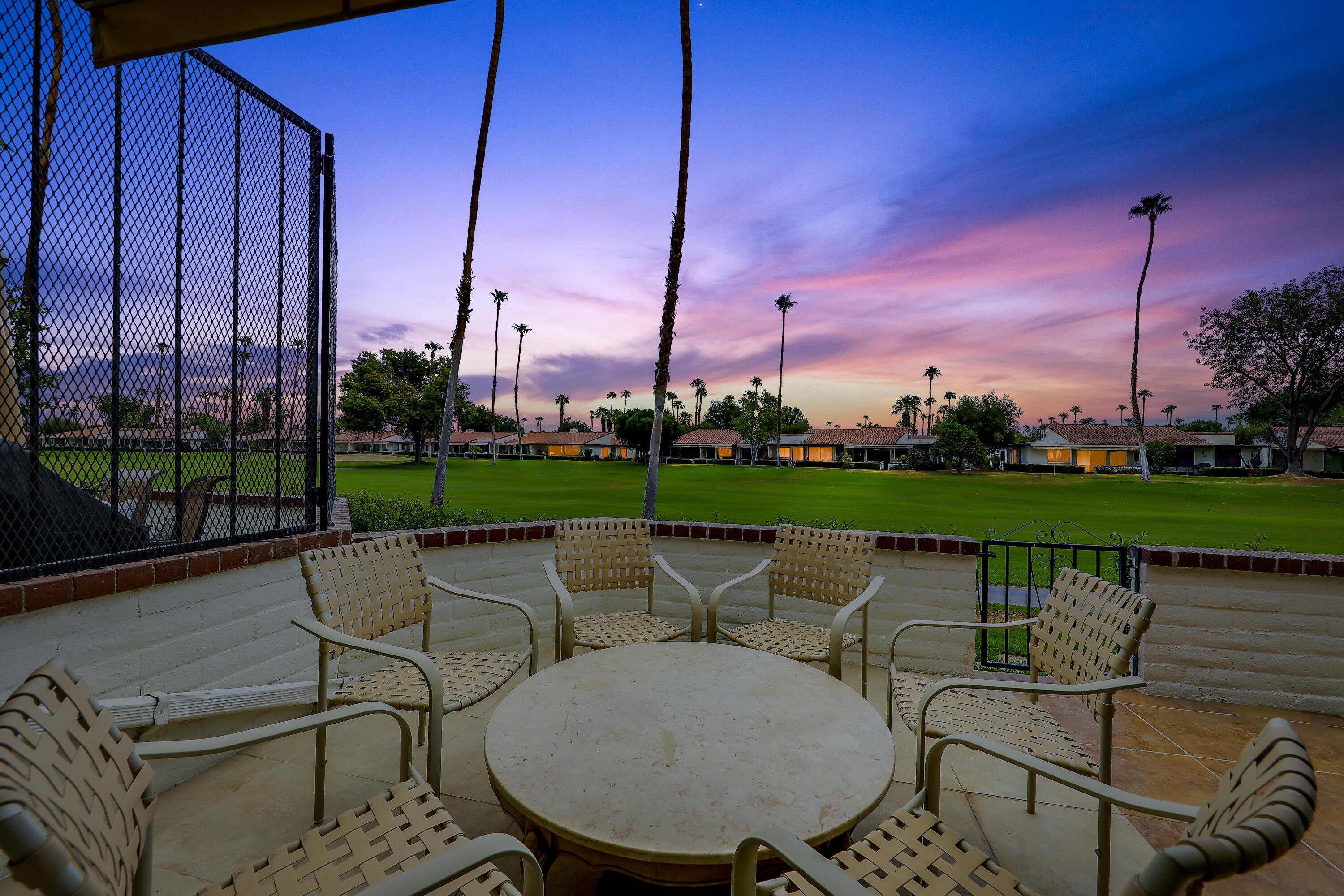 159 Torremolinos Drive Rancho Mirage, CA 92270 - Photo 17 of 17 a view of a chairs and table in the patio