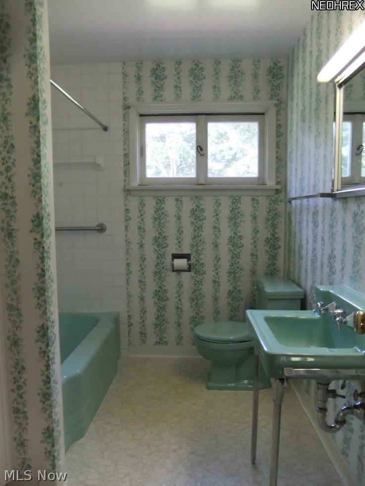 10515 Johnnycake Ridge Road Painesville, OH 44077 - Photo 10 of 10 Spacious full bath with built in linen closet.