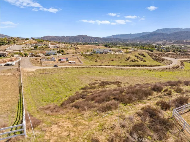 a view of an ocean and a mountain