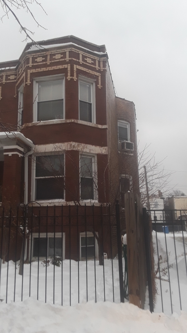 2421 North Harding Avenue, Unit 1 Chicago, IL 60647 - Photo 2 of 14 a front view of a building