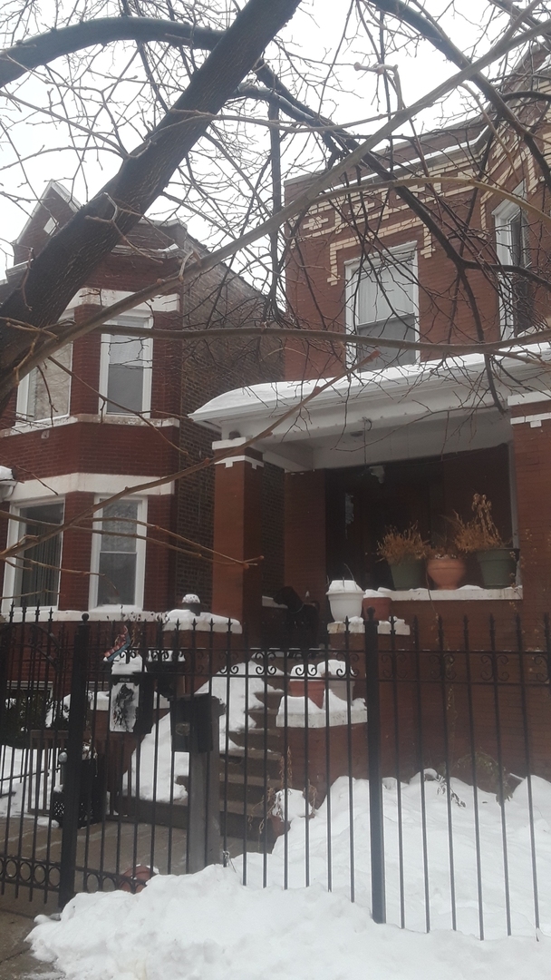2421 North Harding Avenue, Unit 1 Chicago, IL 60647 - Photo 3 of 14 a view of building with outdoor space