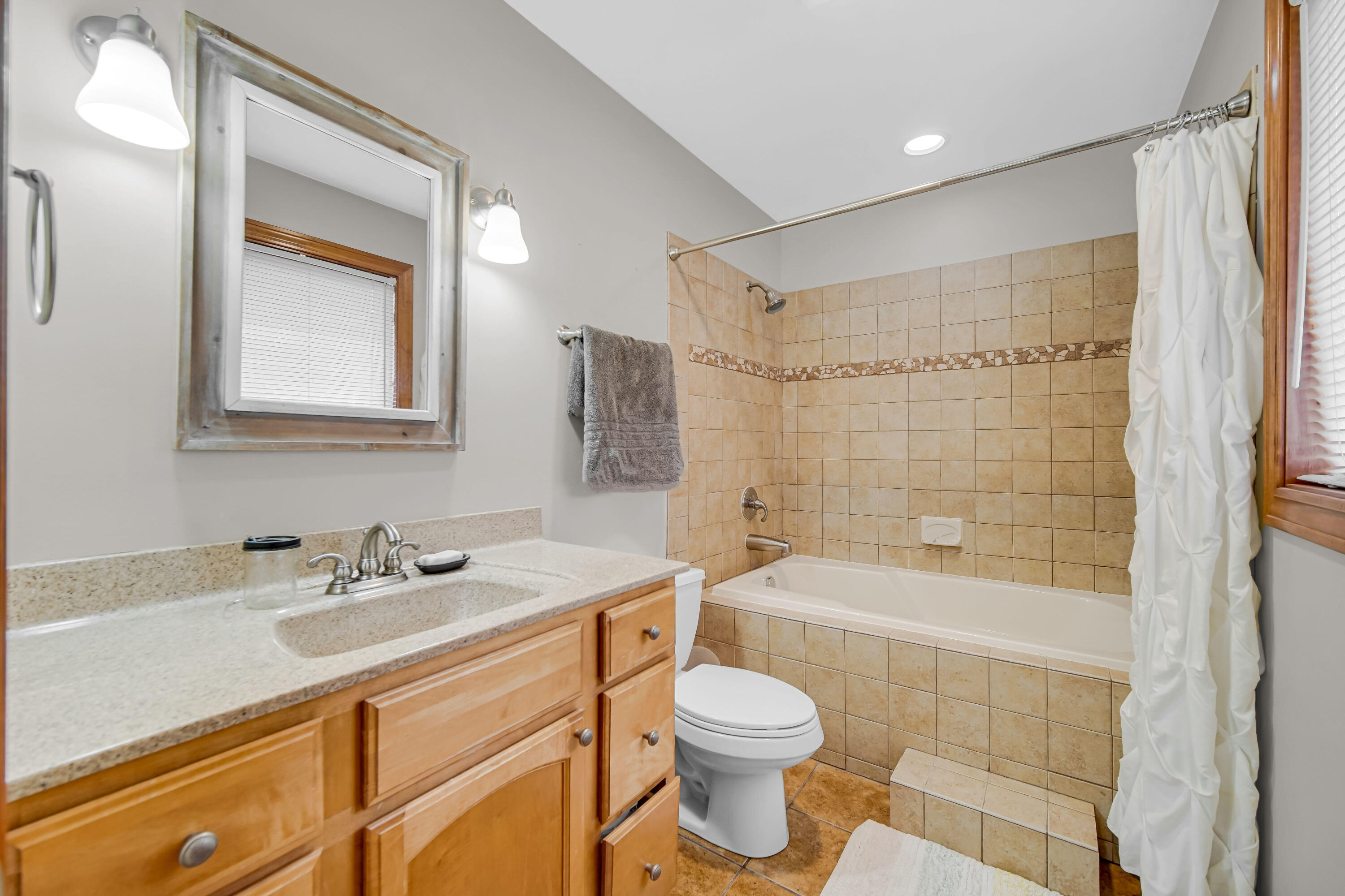1750 West 174th Place Lowell, IN 46356 - Photo 13 of 23 a bathroom with a sink a toilet and shower