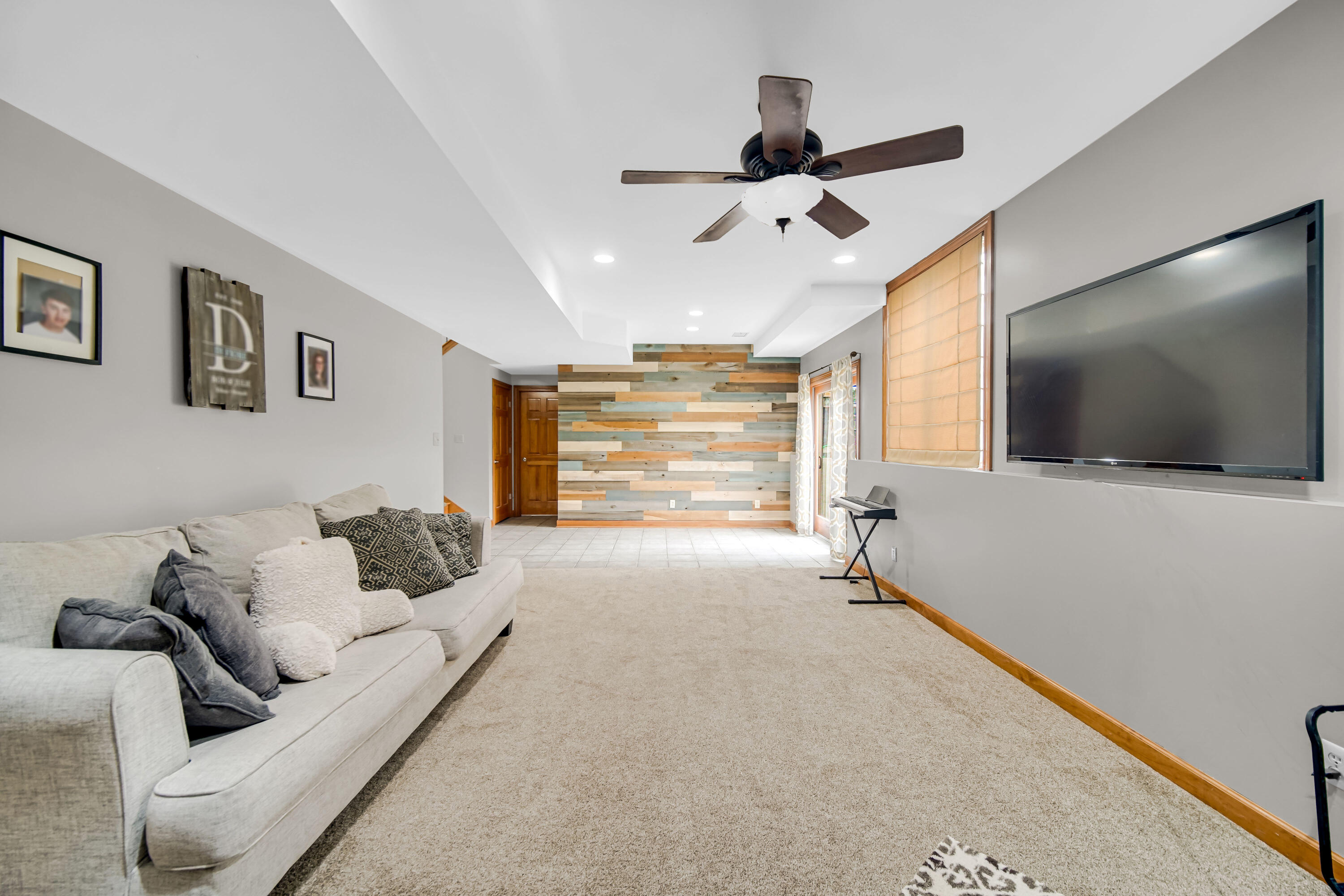 1750 West 174th Place Lowell, IN 46356 - Photo 18 of 23 a living room with furniture and a flat screen tv