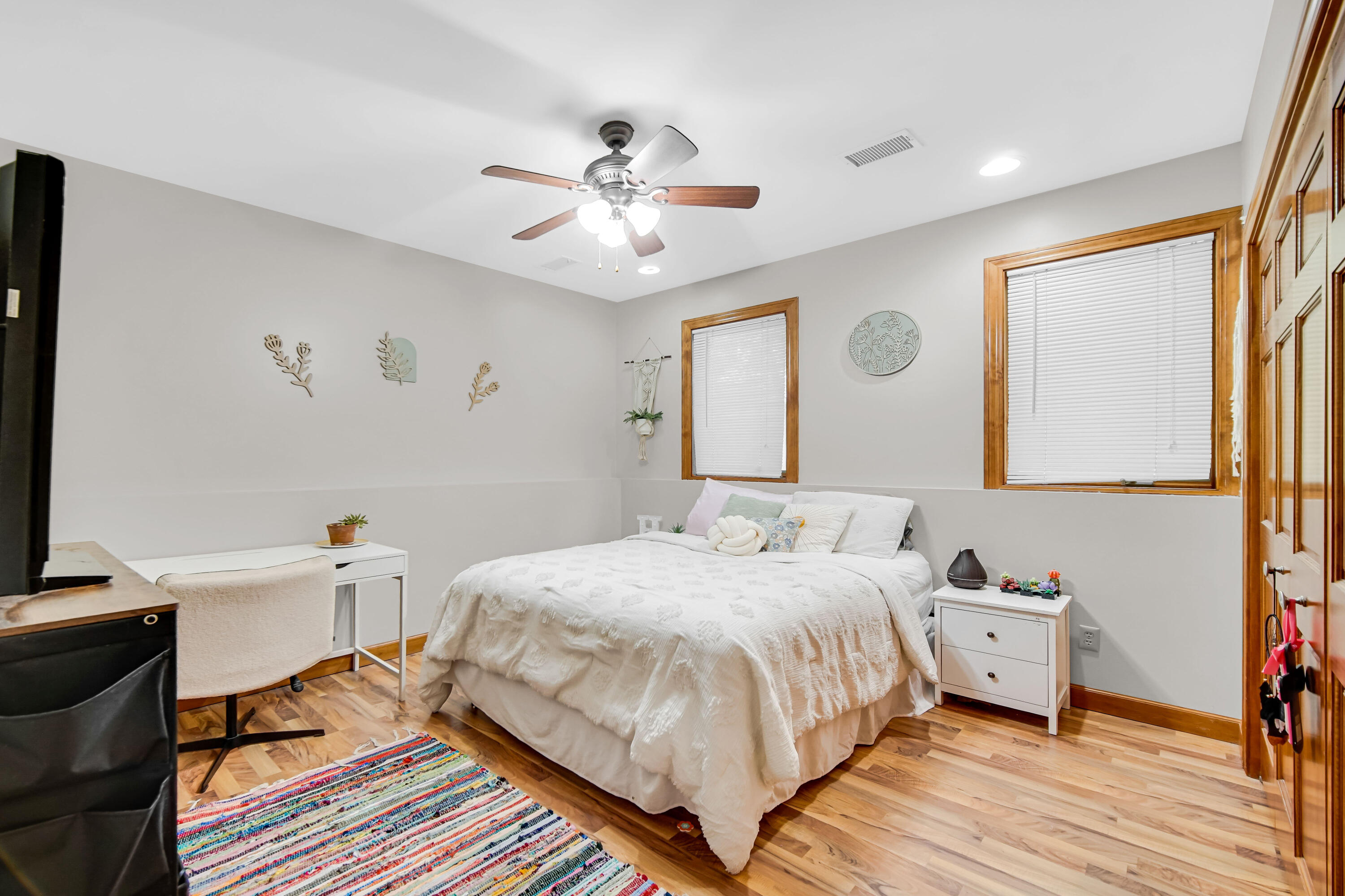 1750 West 174th Place Lowell, IN 46356 - Photo 19 of 23 a bedroom with a bed and a chandelier