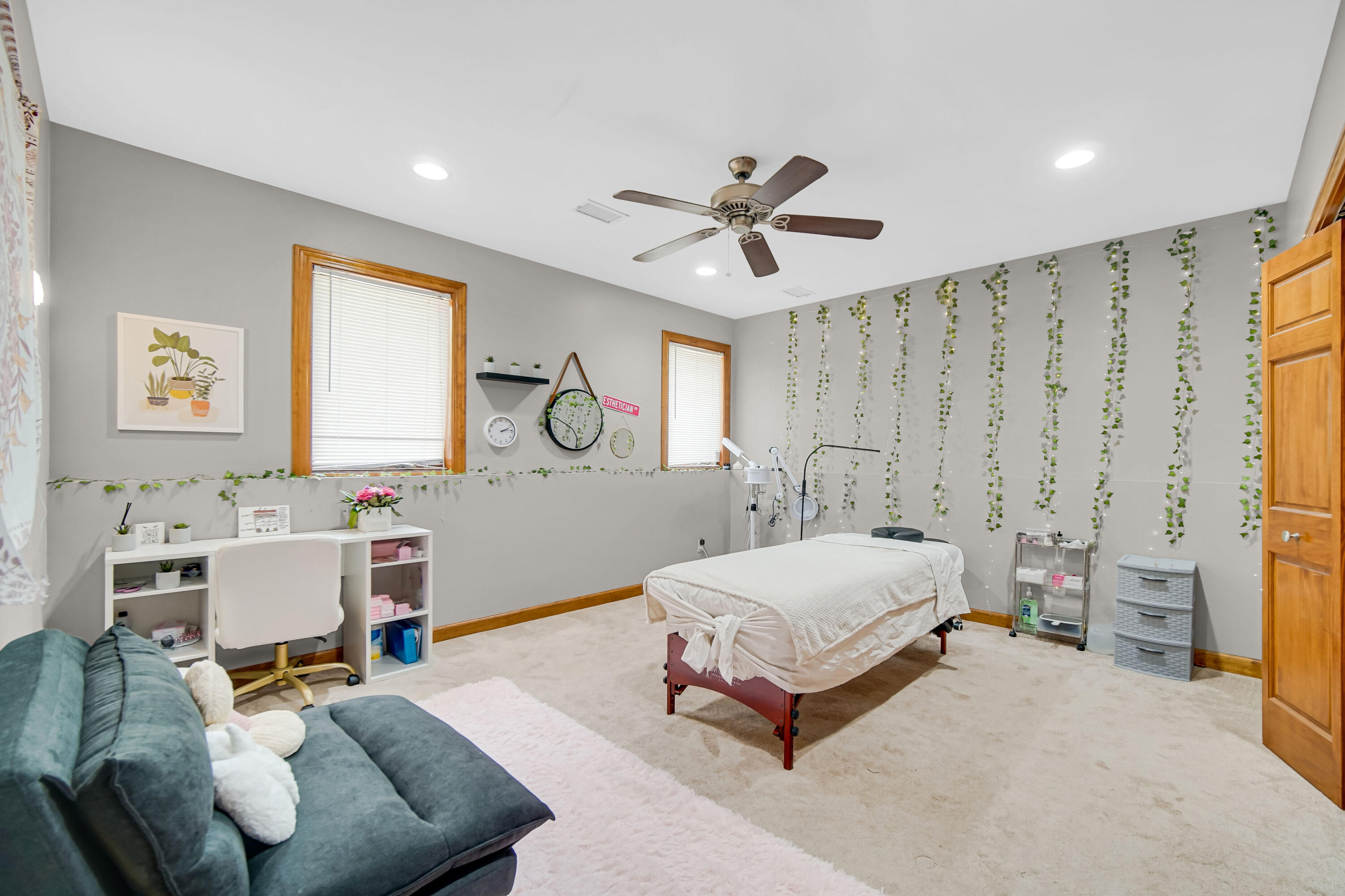 1750 West 174th Place Lowell, IN 46356 - Photo 21 of 23 a bedroom with a bed and a chandelier