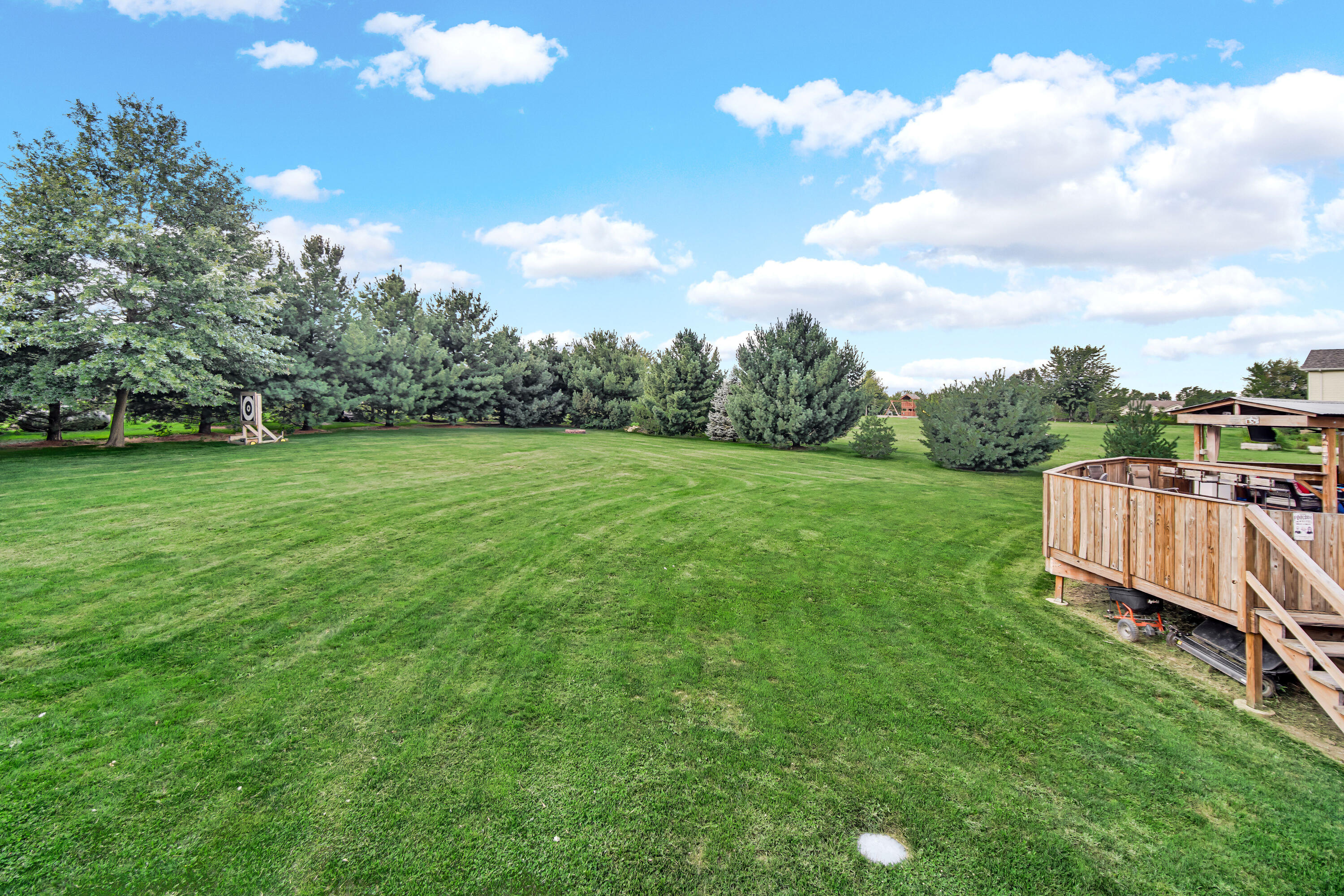1750 West 174th Place Lowell, IN 46356 - Photo 4 of 23 a view of a golf course with a garden