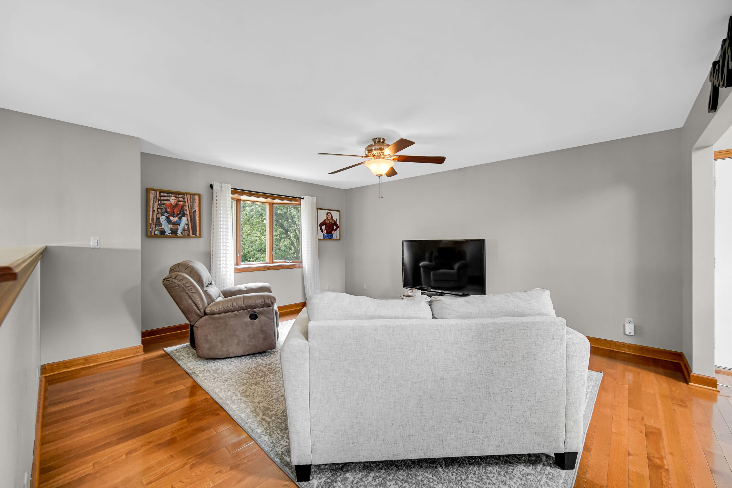 1750 West 174th Place Lowell, IN 46356 - Photo 6 of 23 a living room with furniture and a flat screen tv