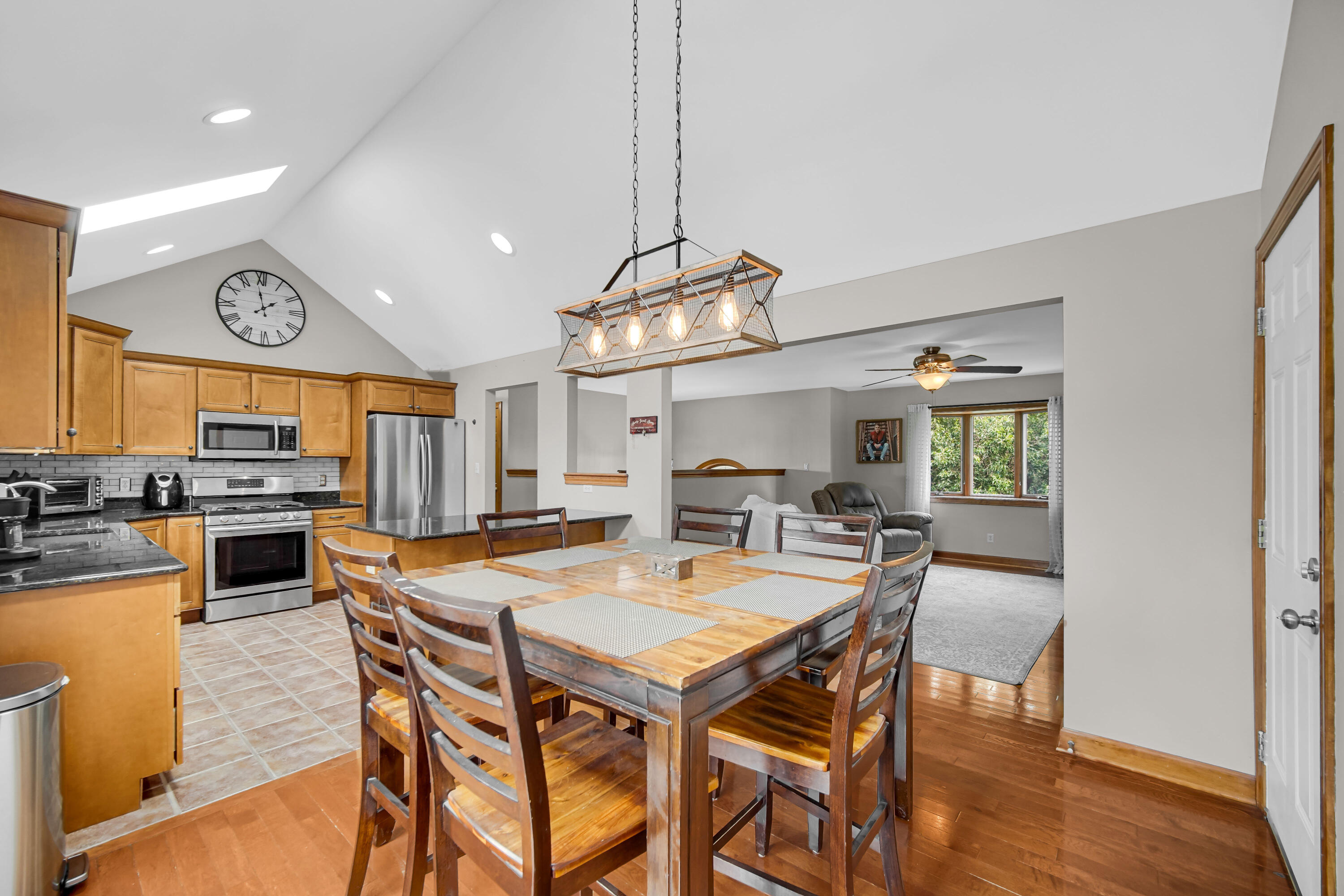 1750 West 174th Place Lowell, IN 46356 - Photo 7 of 23 a view of a dining room with furniture and wooden floor