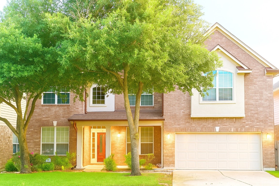 a view of a house with a swimming pool