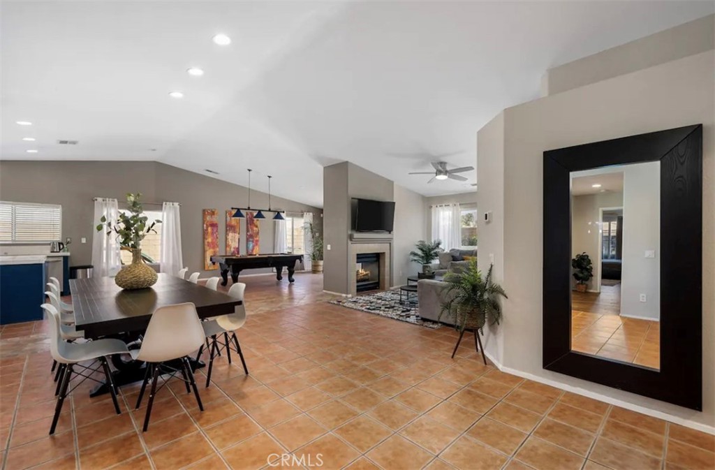 83250 Beverly Court Indio, CA 92201 - Photo 13 of 29 a living room with furniture and a flat screen tv