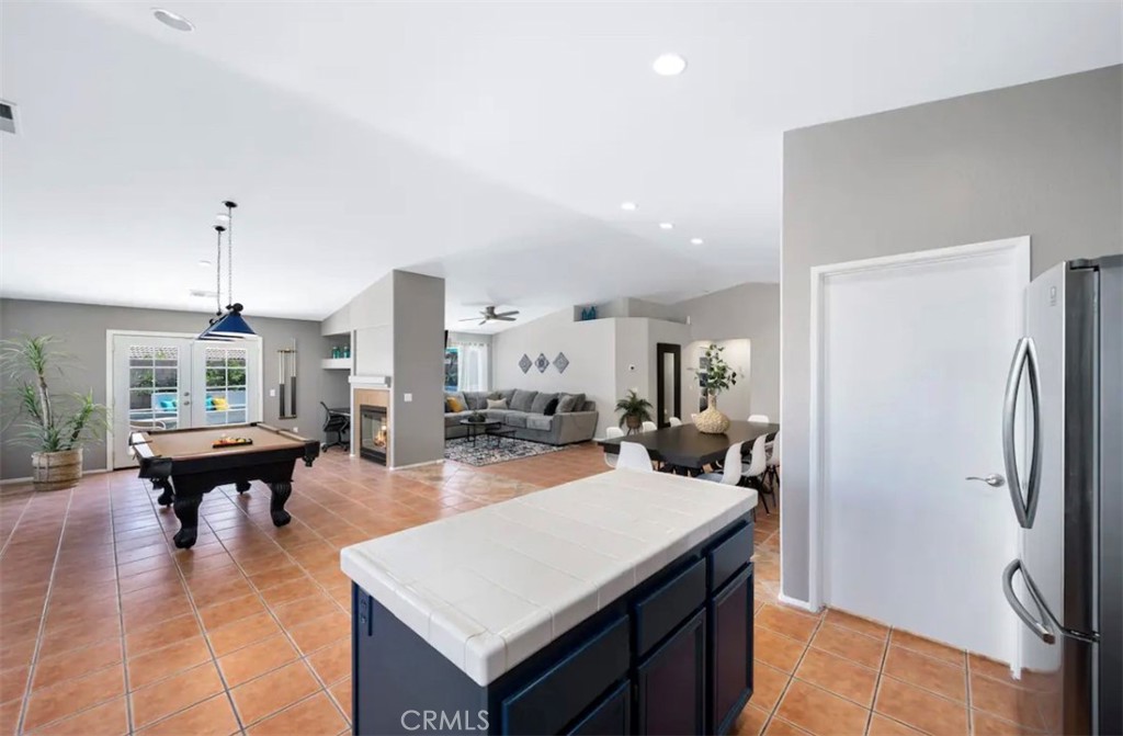 83250 Beverly Court Indio, CA 92201 - Photo 15 of 29 a kitchen with sink and refrigerator