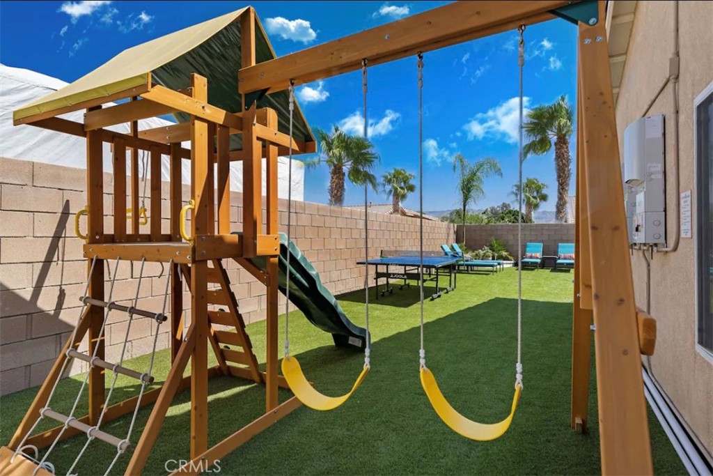 83250 Beverly Court Indio, CA 92201 - Photo 7 of 29 a view of a swimming pool with a patio