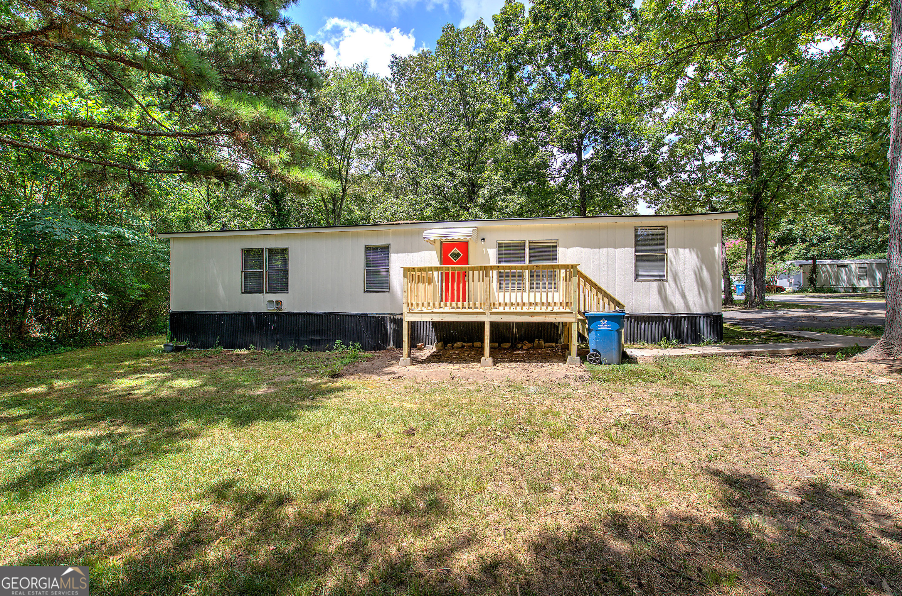 a house view with a garden space