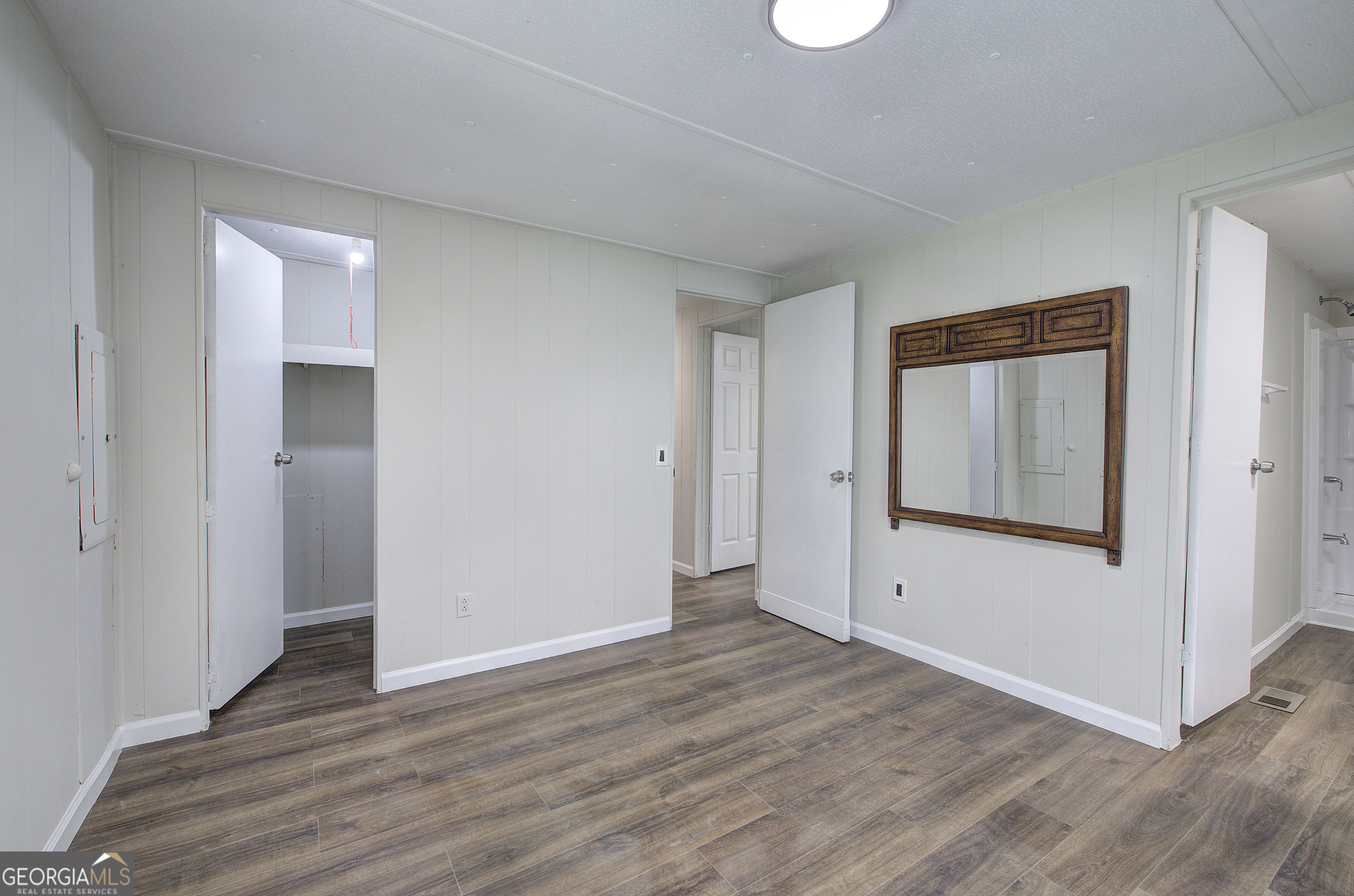 264 East Big Indian Trail Northeast Rome, GA 30165 - Photo 21 of 31 a view of an empty room with wooden floor and closet