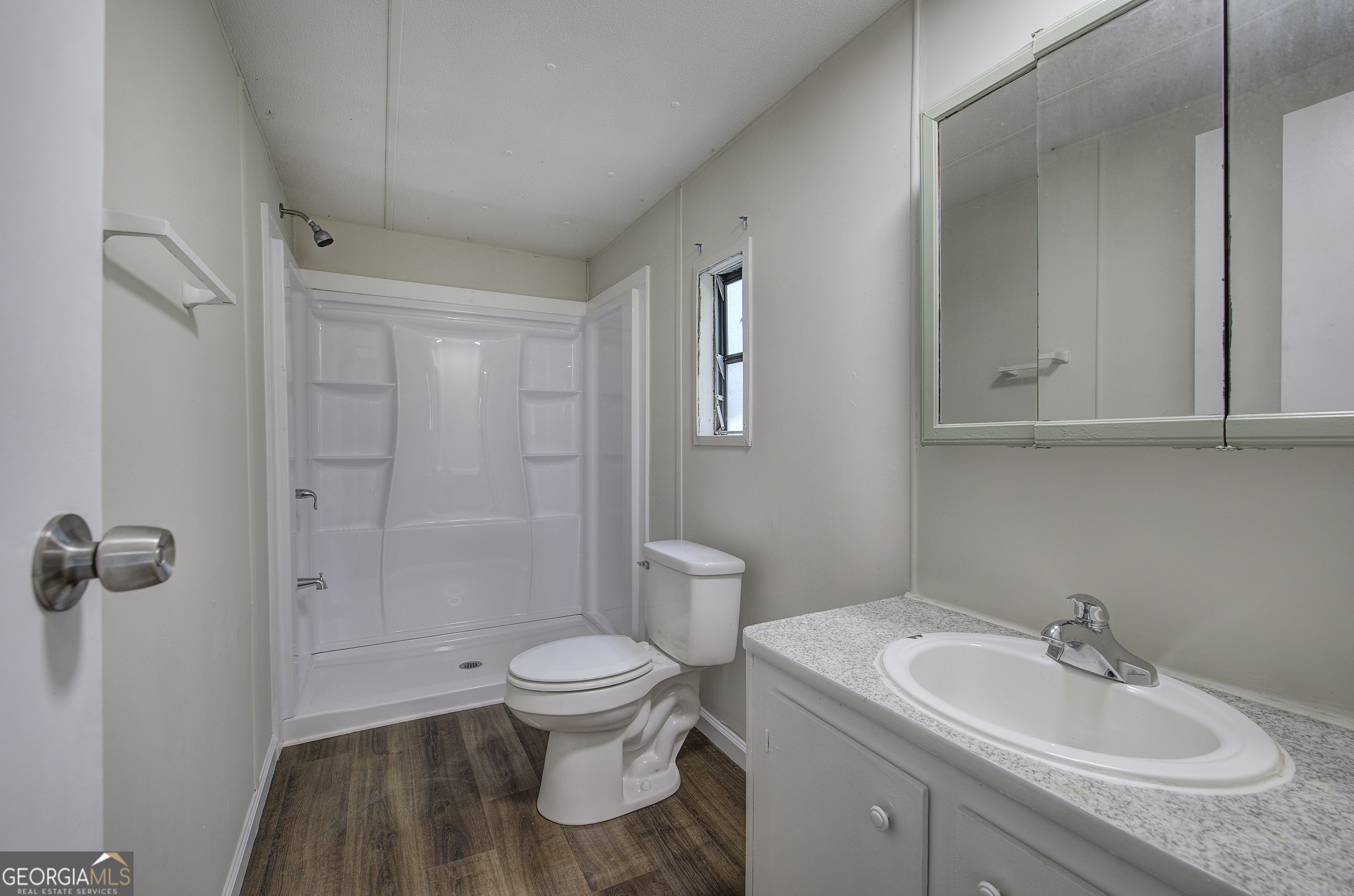 264 East Big Indian Trail Northeast Rome, GA 30165 - Photo 24 of 31 a bathroom with a sink toilet and shower