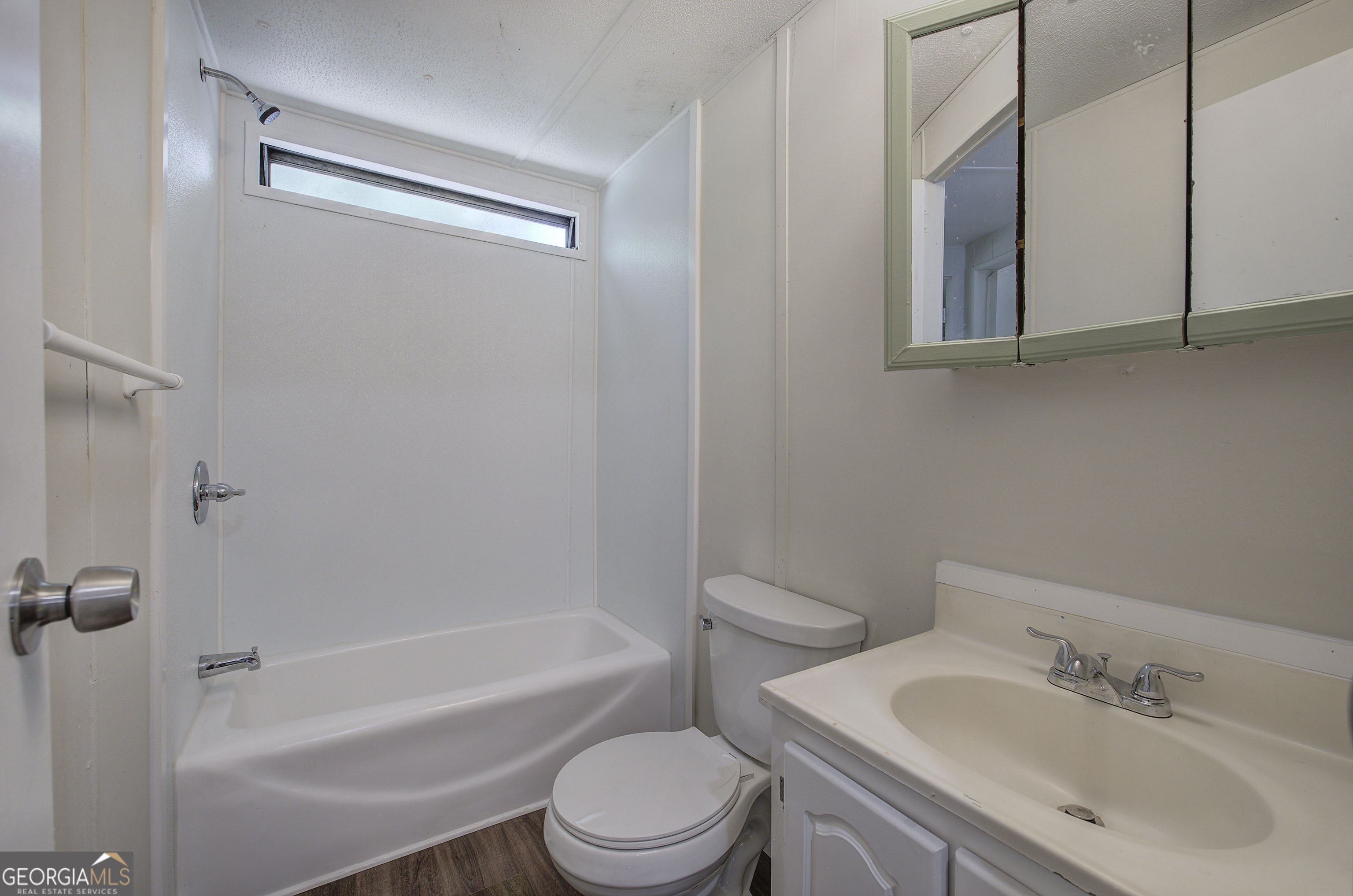 264 East Big Indian Trail Northeast Rome, GA 30165 - Photo 28 of 31 a bathroom with a sink toilet and shower