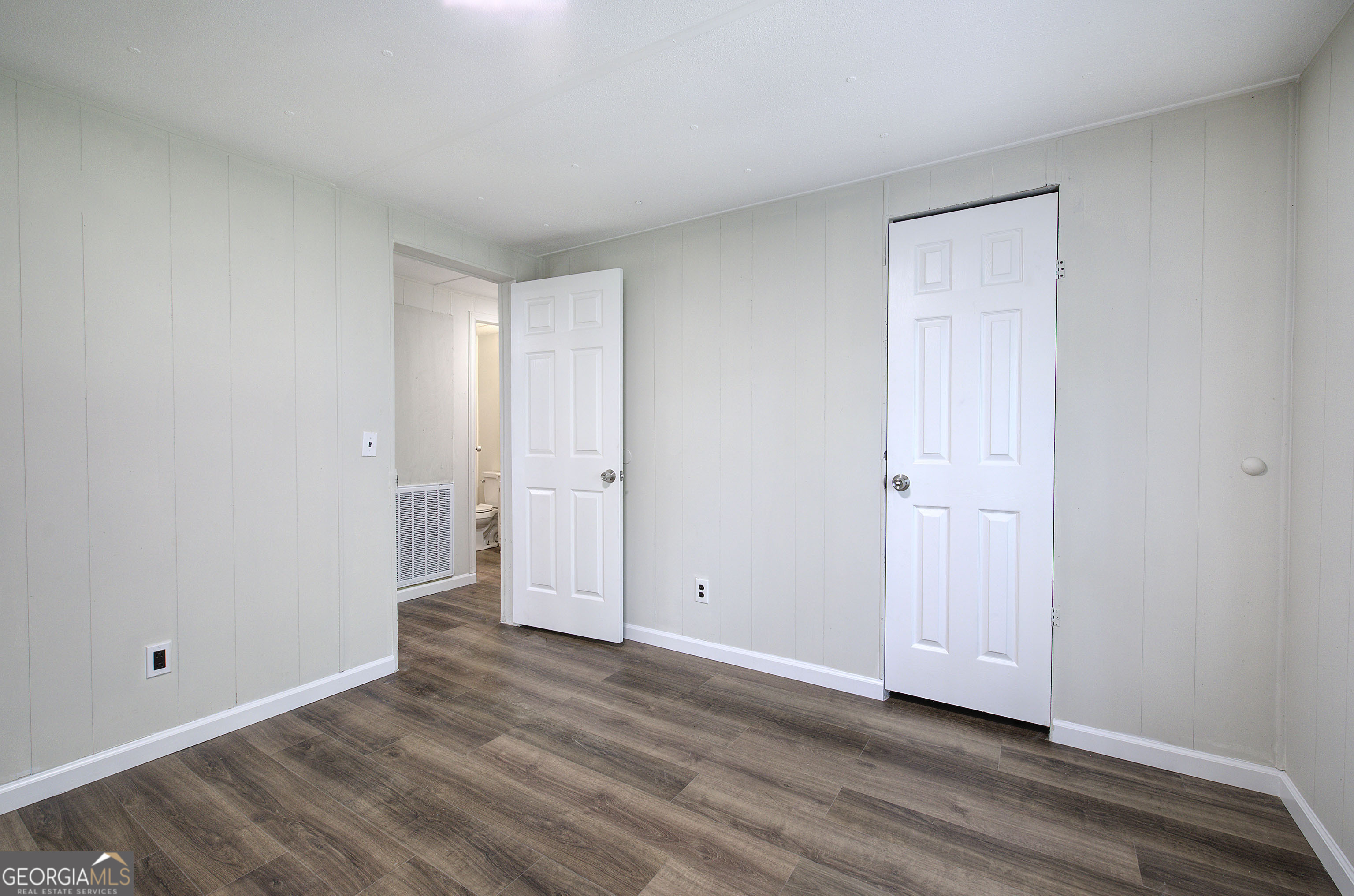 264 East Big Indian Trail Northeast Rome, GA 30165 - Photo 30 of 31 a view of an empty room and wooden floor