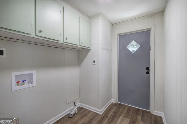 a view of room with window and hallway