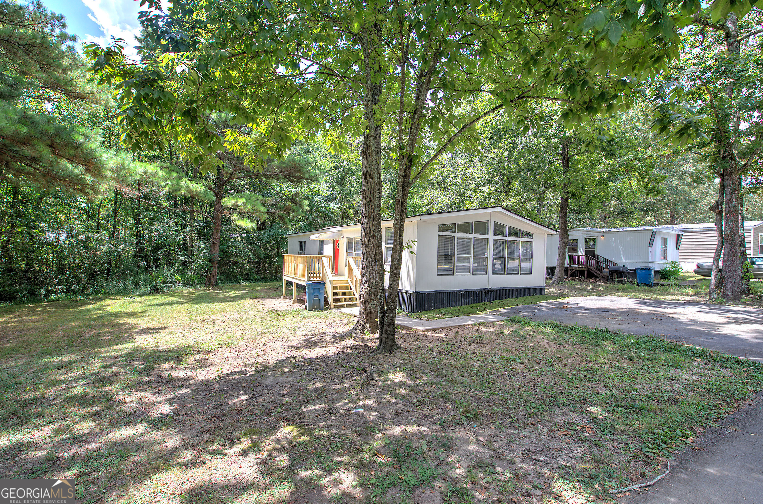 264 East Big Indian Trail Northeast Rome, GA 30165 - Photo 5 of 31 a house with trees in the background