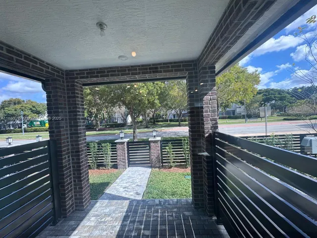 a view of outdoor space with water fountain