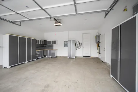 a view of an empty room with closet