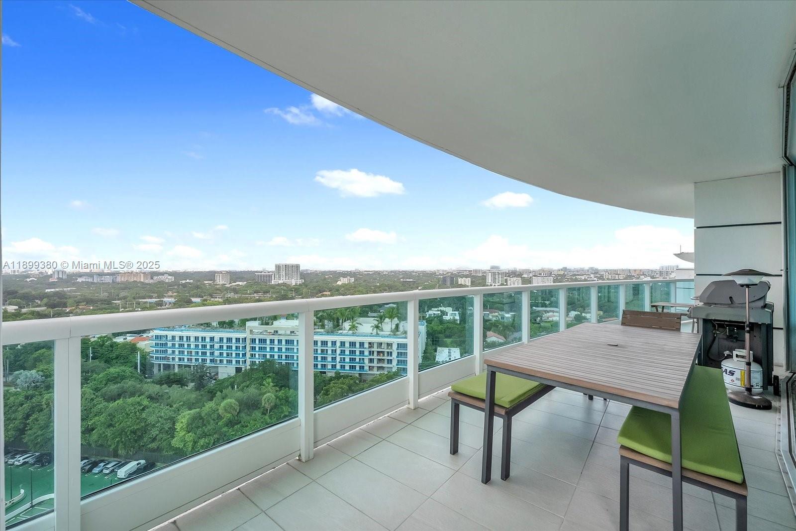 2127 Brickell Avenue, Unit 2005 Miami, FL 33129 - Photo 38 of 53 a view of a chairs and table in the terrace