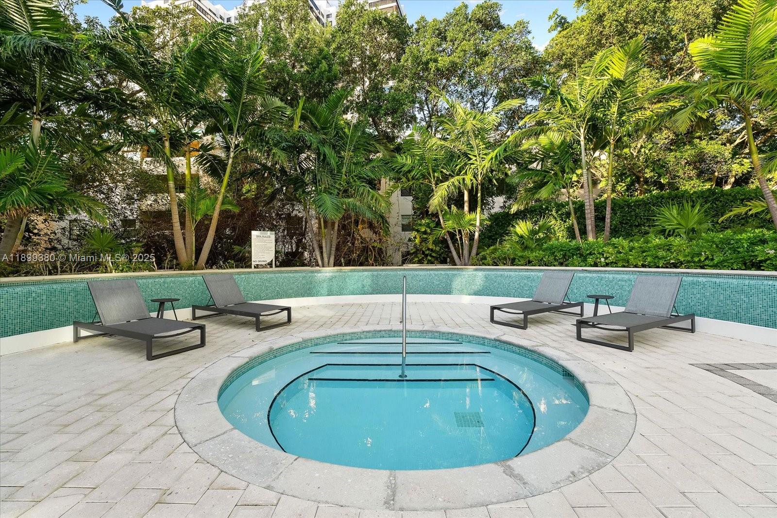 2127 Brickell Avenue, Unit 2005 Miami, FL 33129 - Photo 39 of 53 swimming pool view with a outdoor seating