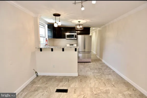 a view of a kitchen with a sink