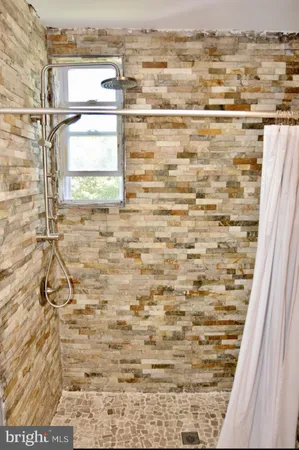 a bathroom with a window