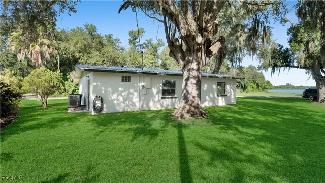 a view of a back yard of the house