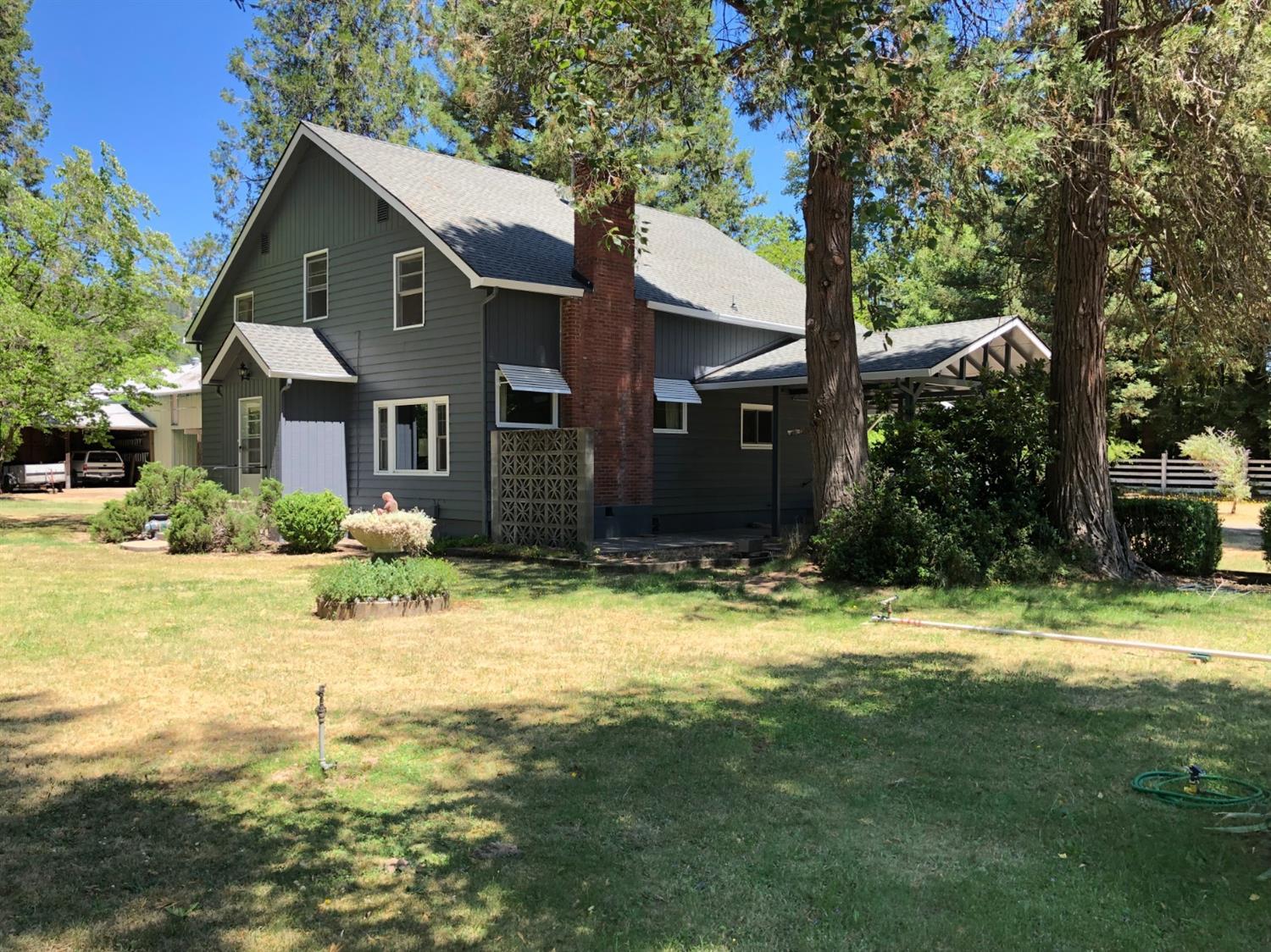 2368 Upper River Road Grants Pass, OR 97526 - Photo 17 of 30 a view of a house with a yard