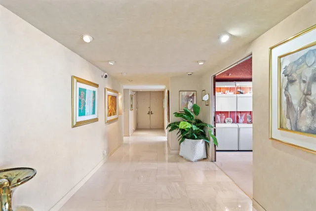 a bedroom with a bed a window and dresser