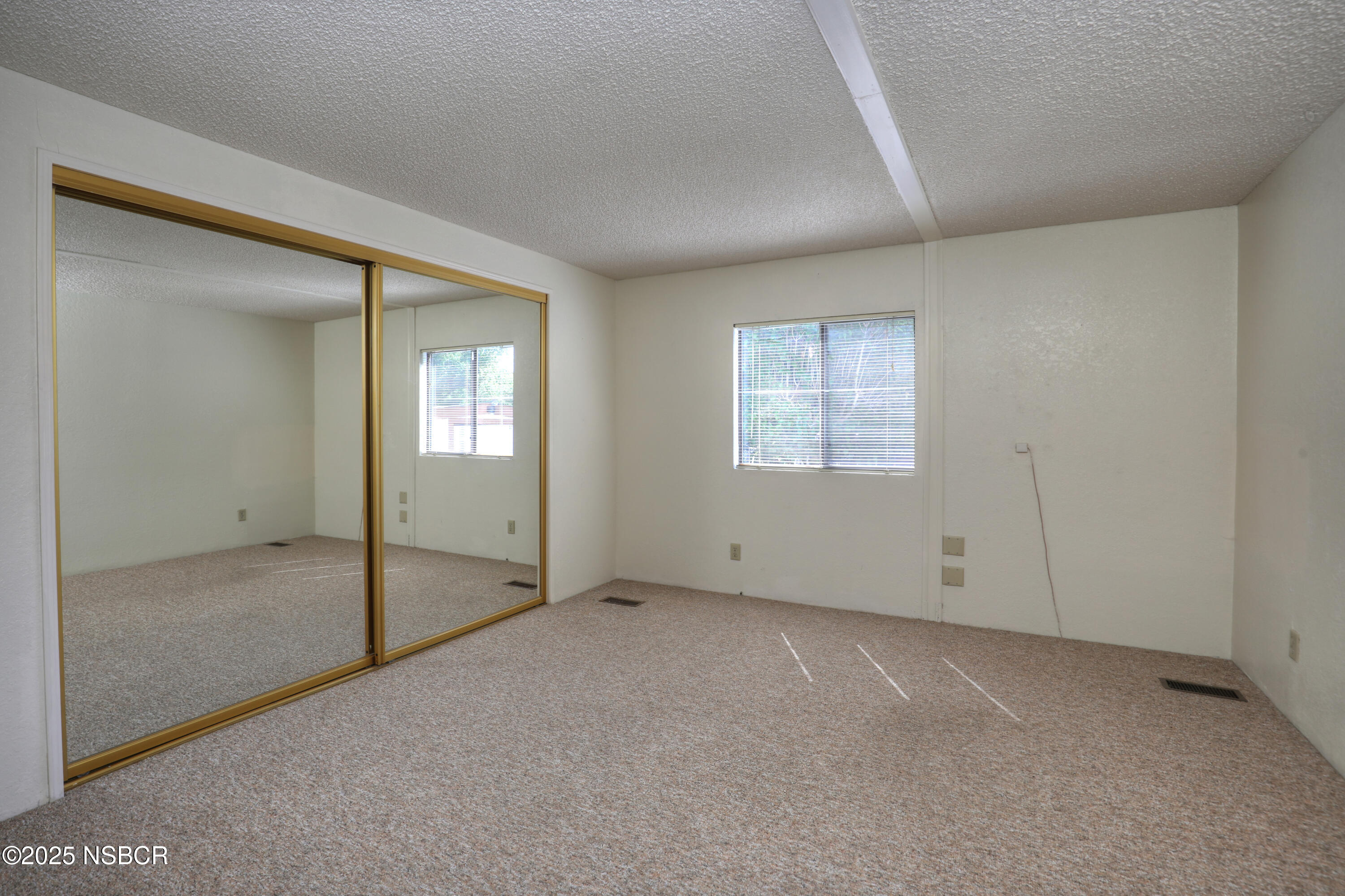 80 Zaca Street, Unit 4 Buellton, CA 93427 - Photo 15 of 25 a view of an empty room with window