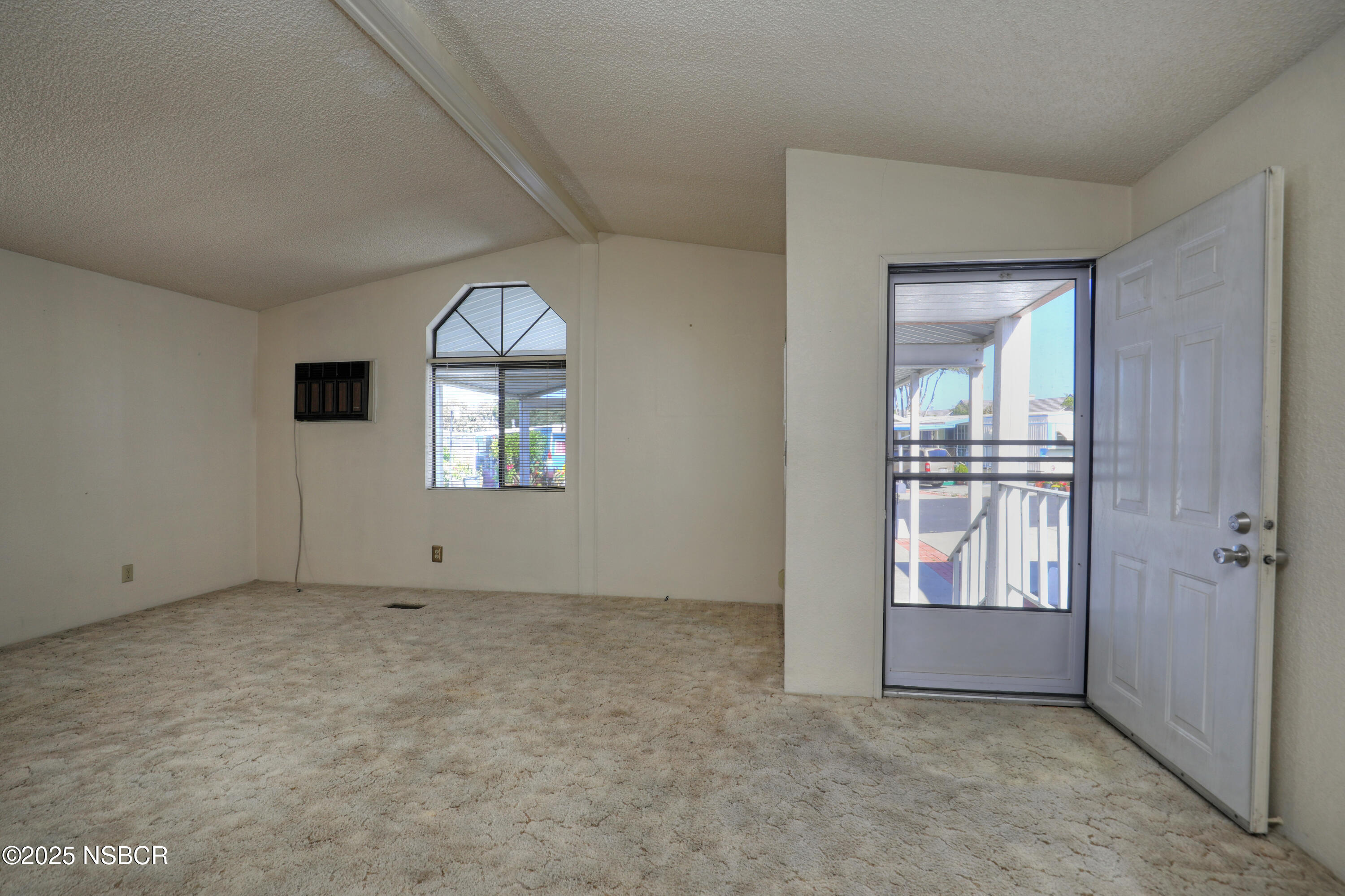 80 Zaca Street, Unit 4 Buellton, CA 93427 - Photo 3 of 25 an empty room that has a window
