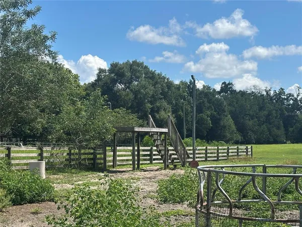 a view of a golf course with a lake