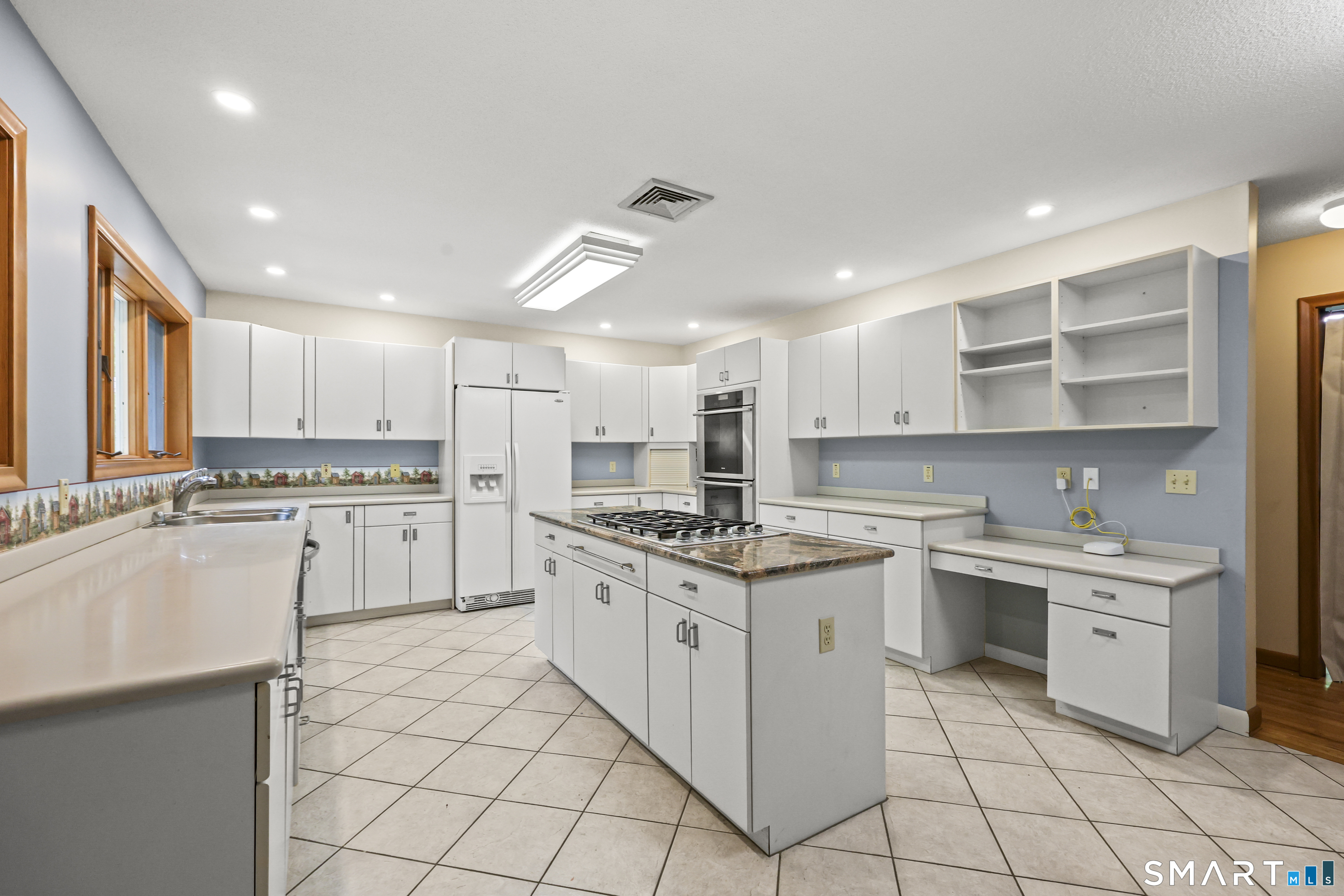 96 Spak Road Willington, CT 06279 - Photo 12 of 40 Ample cabinet storage & built-in desk/coffee bar.