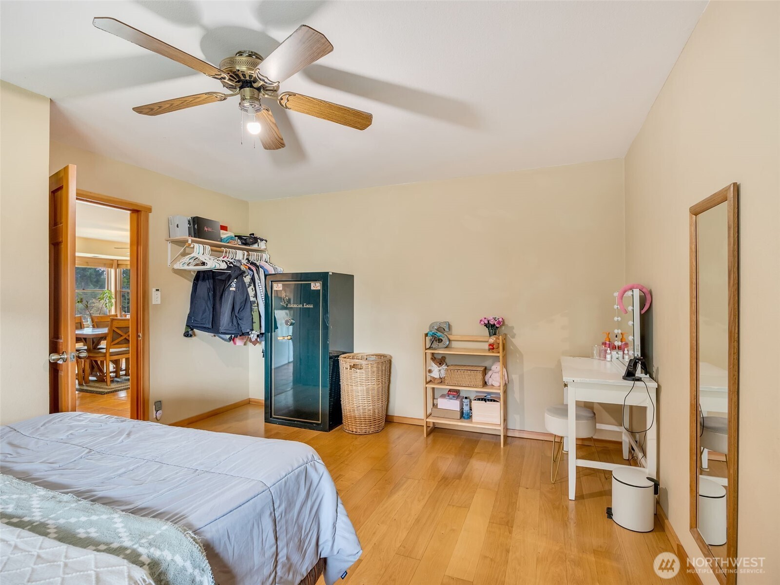 20003 Sandridge Road Long Beach, WA 98631 - Photo 21 of 39 a bedroom with a bed and a wooden floor