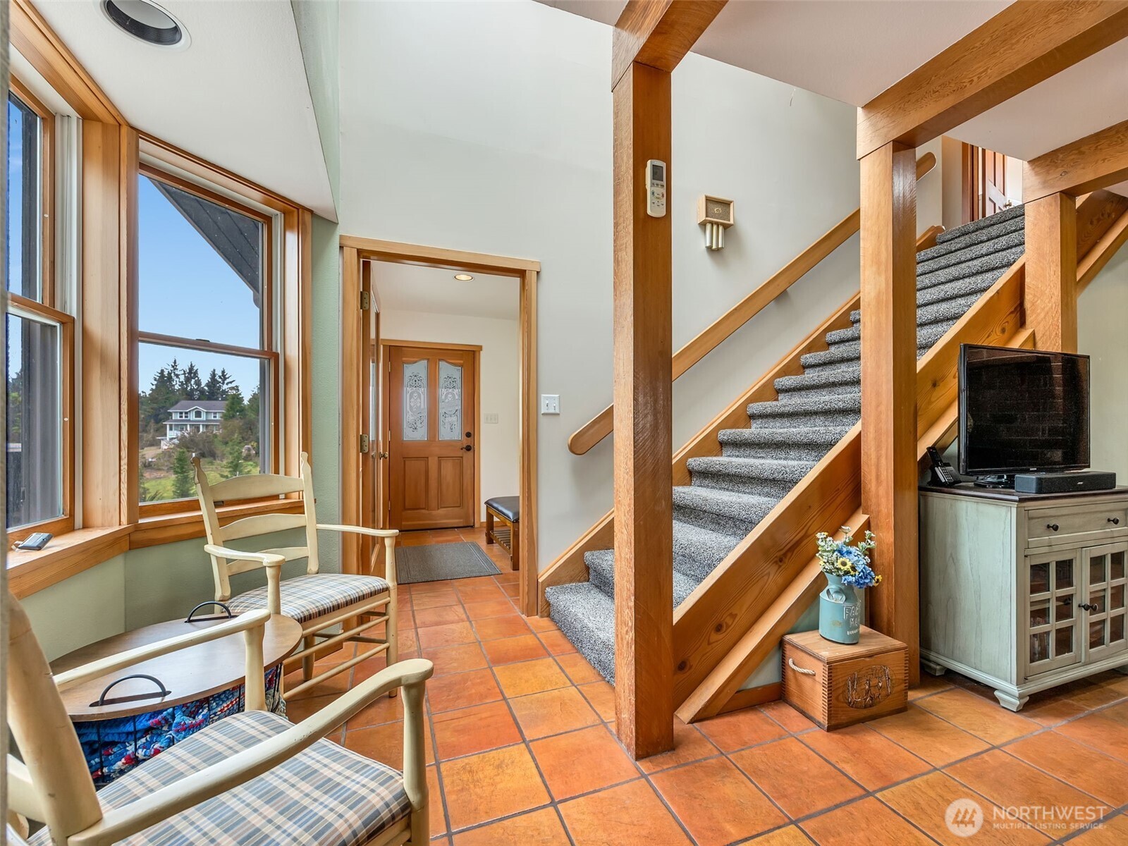 20003 Sandridge Road Long Beach, WA 98631 - Photo 5 of 39 a view of a livingroom with furniture and a flat screen tv