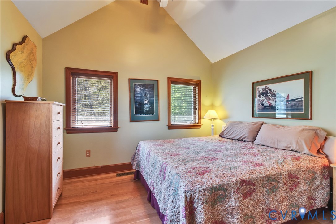 176 Baypointe Court Reedville, VA 22539 - Photo 46 of 60 a bedroom with a bed and a window