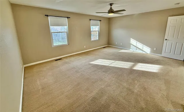 en empty room with windows