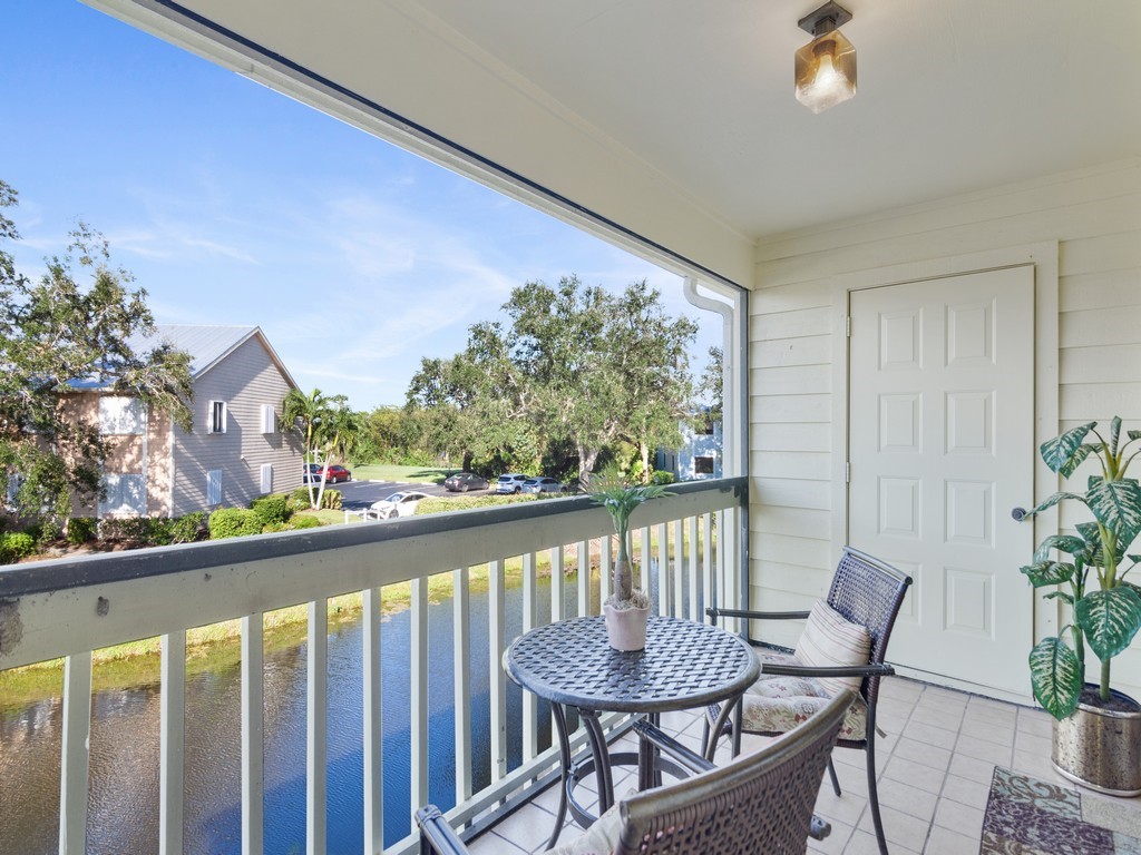 5735 Marina Drive, Unit 3 Sebastian, FL 32958 - Photo 12 of 36 a view of a chairs and table in patio