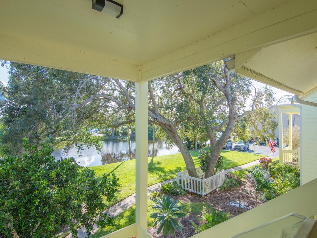 5735 Marina Drive, Unit 3 Sebastian, FL 32958 - Photo 2 of 36 a view of a garden with a tree