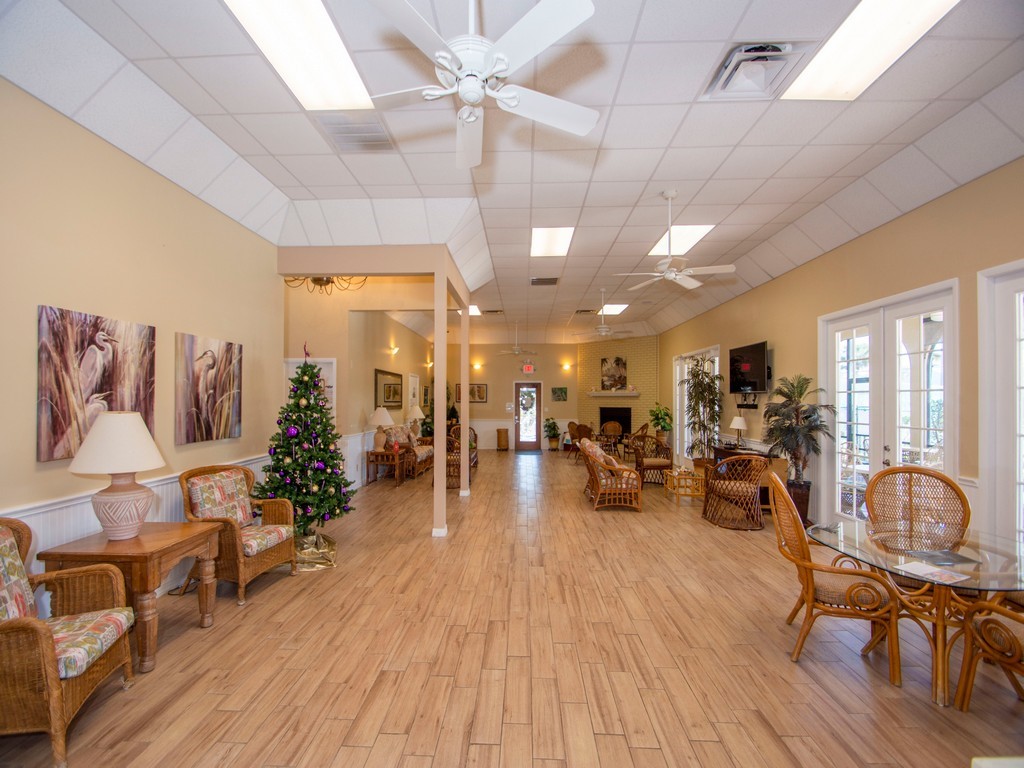 5735 Marina Drive, Unit 3 Sebastian, FL 32958 - Photo 25 of 36 a living room with furniture and wooden floor
