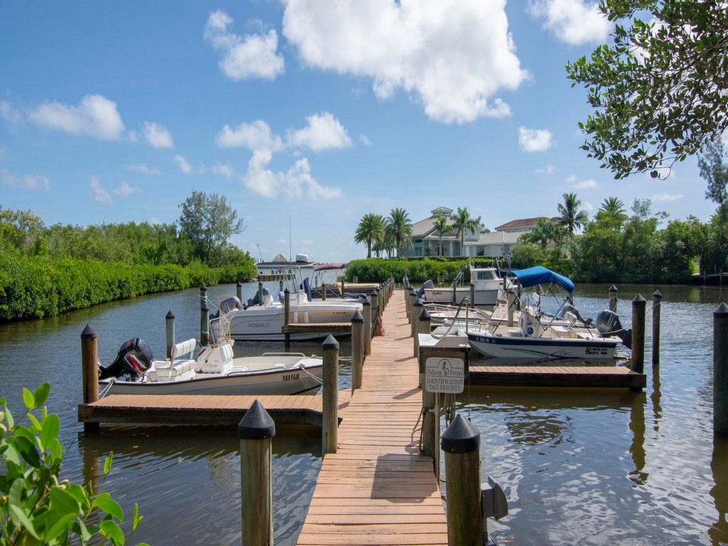 5735 Marina Drive, Unit 3 Sebastian, FL 32958 - Photo 31 of 36 a view of a lake with outdoor seating