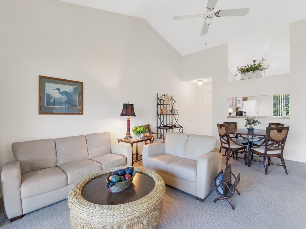 5735 Marina Drive, Unit 3 Sebastian, FL 32958 - Photo 4 of 36 a living room with furniture and a rug