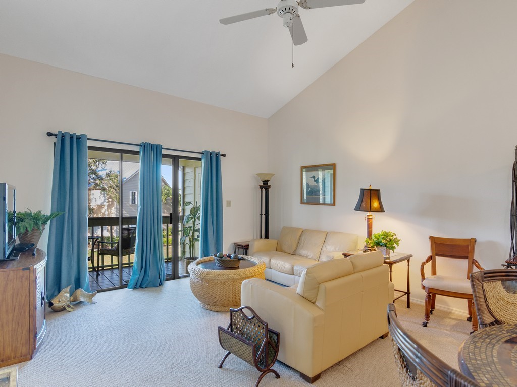 5735 Marina Drive, Unit 3 Sebastian, FL 32958 - Photo 7 of 36 a living room with furniture and a window