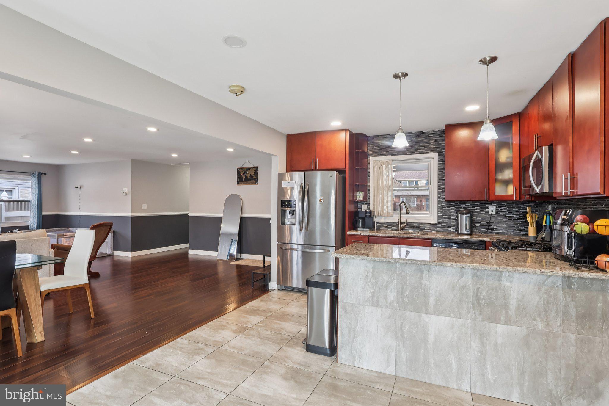 71 Harrington Circle Willingboro, NJ 08046 - Photo 13 of 37 a large white kitchen with lots of counter space and stainless steel appliances