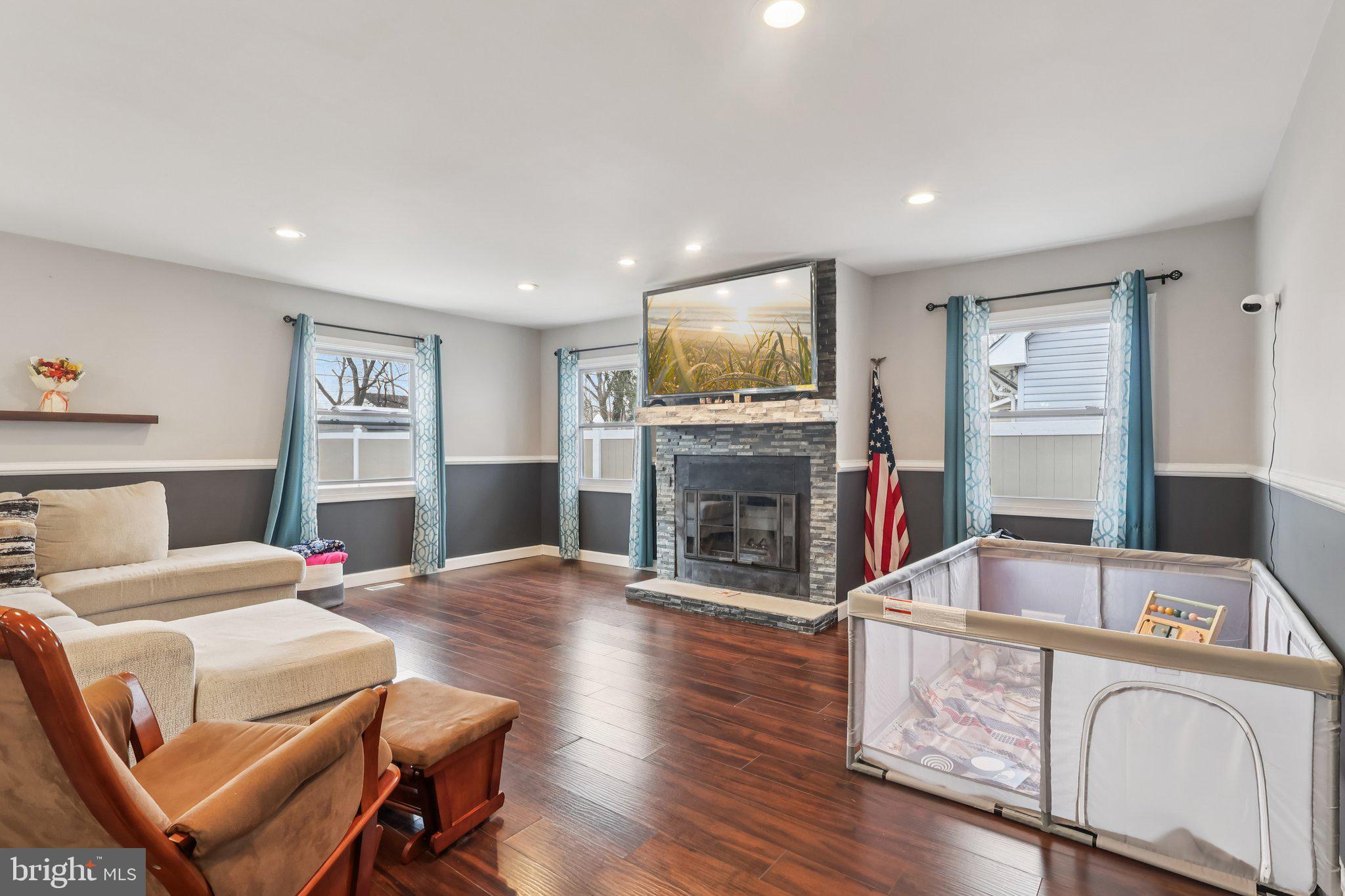 71 Harrington Circle Willingboro, NJ 08046 - Photo 5 of 37 a living room with furniture and a fireplace