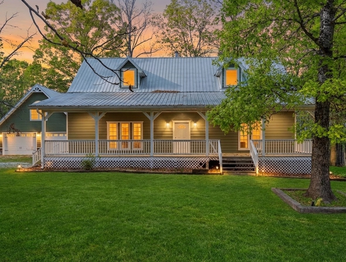 1148 Stoltz Road Centerville, TN 37033 - Photo 1 of 52 a front view of a house with a garden