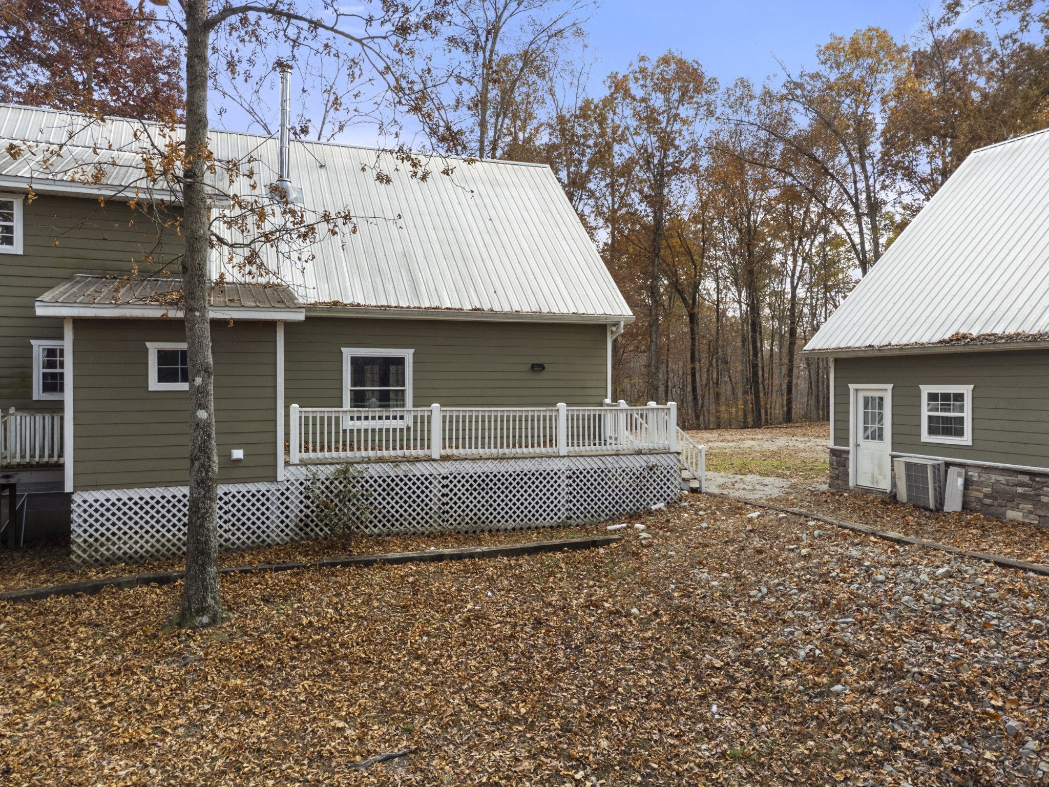 1148 Stoltz Road Centerville, TN 37033 - Photo 15 of 52 a front view of a house with a garden